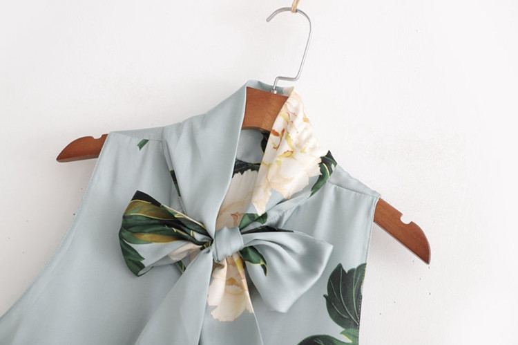 Kék színű, mintás megkötős női felső