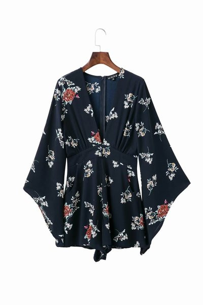 Model nou de salopetă de damă cu decolteu în V în albastru și alb