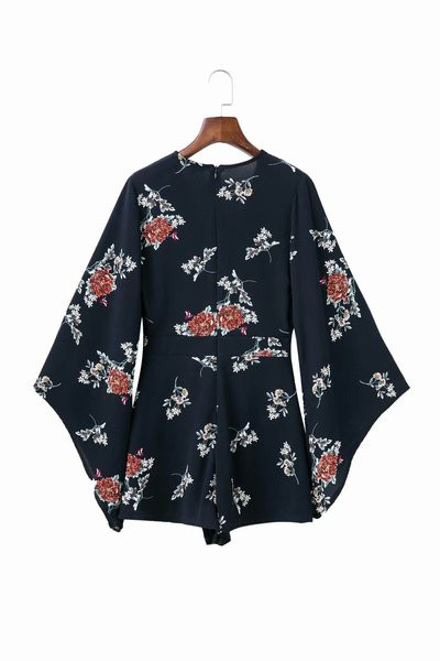 Model nou de salopetă de damă cu decolteu în V în albastru și alb