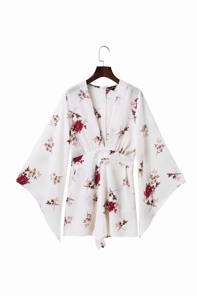 Model nou de salopetă de damă cu decolteu în V în albastru și alb