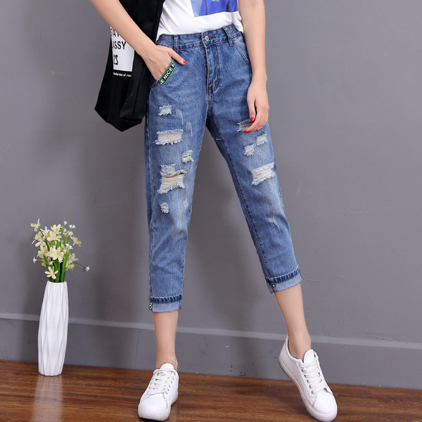 Blugi de dama moderni lungime 9/8 cu motive rupte