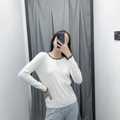 Pulover de dama cu decolteu oval in alb si negru