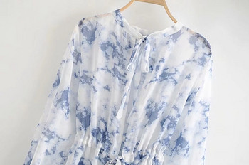 Aktuális női ruha O-nyakkivágással és övvel