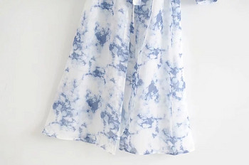 Aktuális női ruha O-nyakkivágással és övvel