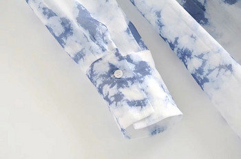 Aktuális női ruha O-nyakkivágással és övvel