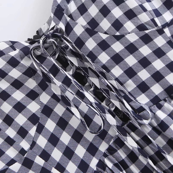 Női kockás felső, nyakkendővel és vékony pántokkal