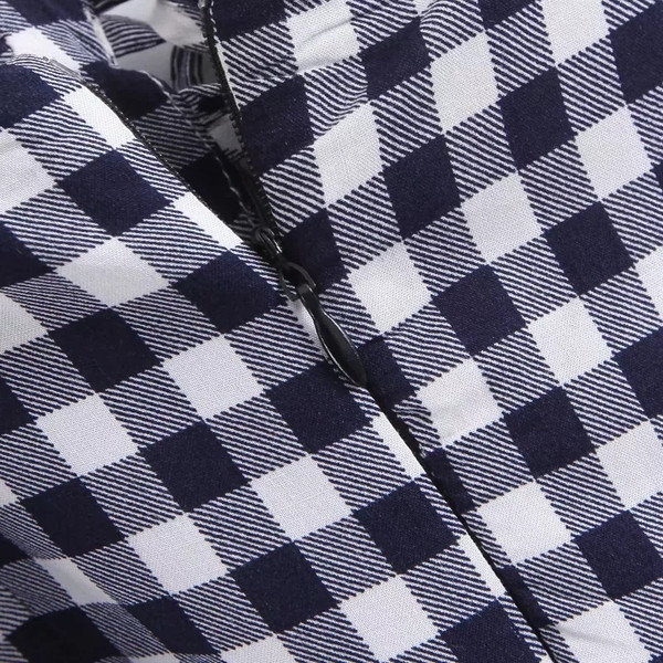 Női kockás felső, nyakkendővel és vékony pántokkal