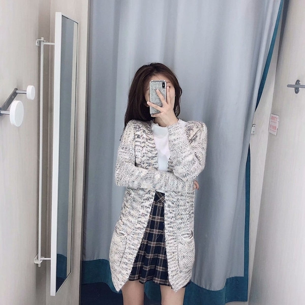 Hosszú, zsebes női kardigán