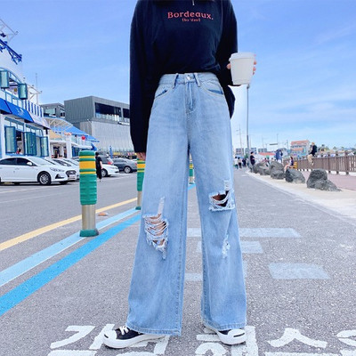 Női farmer széles modell szakadt motívumokkal és méretekkel 4XL-ig