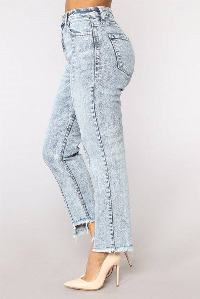 Lezser női hosszú farmer, szakadt motívumokkal, világos színben