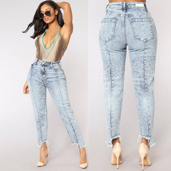 Lezser női hosszú farmer, szakadt motívumokkal, világos színben