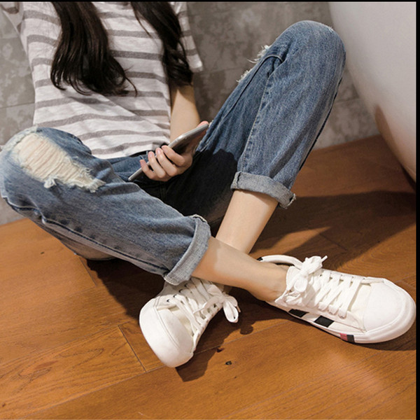 Blugi casual de dama cu motive rupte