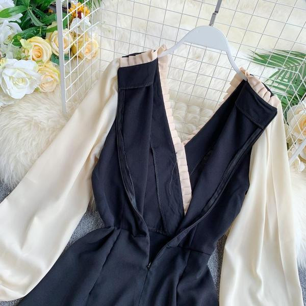 Stílusos női ruha V-nyakú és hosszú ujjú