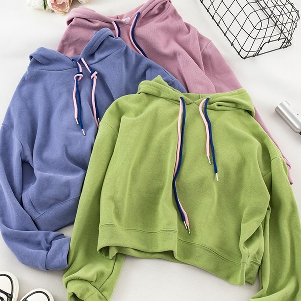 Modern női pulóver kapucnival több színben