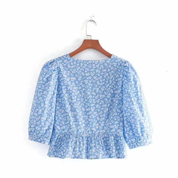 Bluză de damă cu model floral în albastru