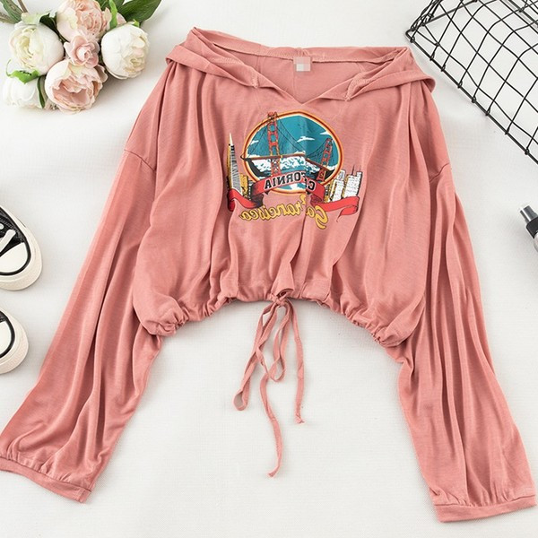 Női sportblúz rátéttel és kapucnival - többféle színben