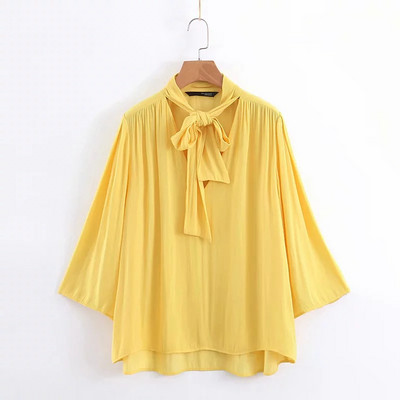 Bluză de damă cu mâneci lotus de culoare galbenă