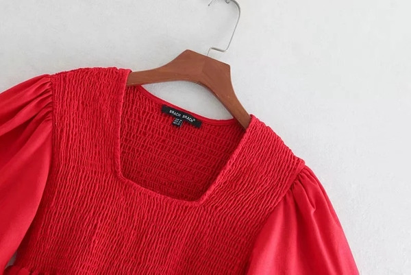 Piros és fehér lótusz ujjú női blúz