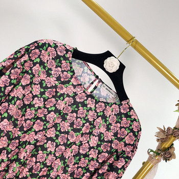 Női ruha hosszú ujjal és elasztikus anyaggal