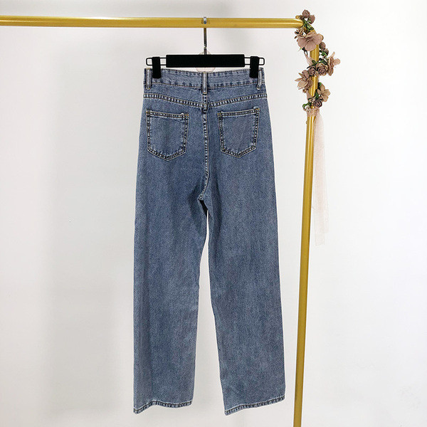 Blugi de damă cu curea - un model larg în albastru