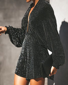 Modern női overál mély nyakkivágással és hosszú ujjal, két színben