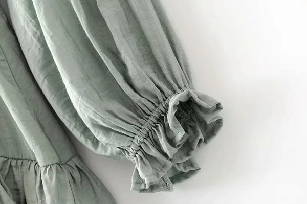 Zöld színű, hosszú ujjú női ruha