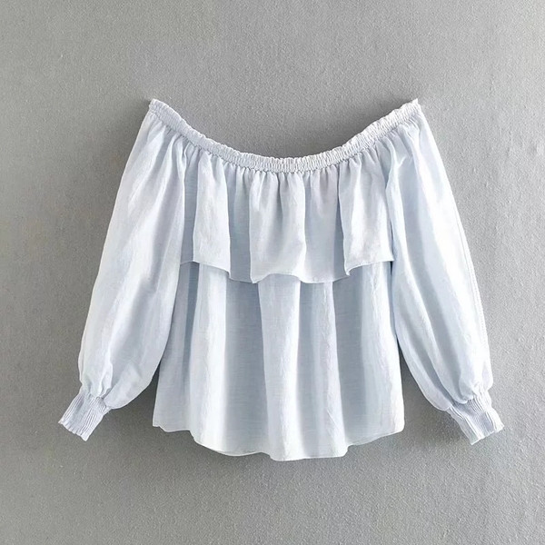 Női blúz csupasz váll és hosszú ujjú fehér színben