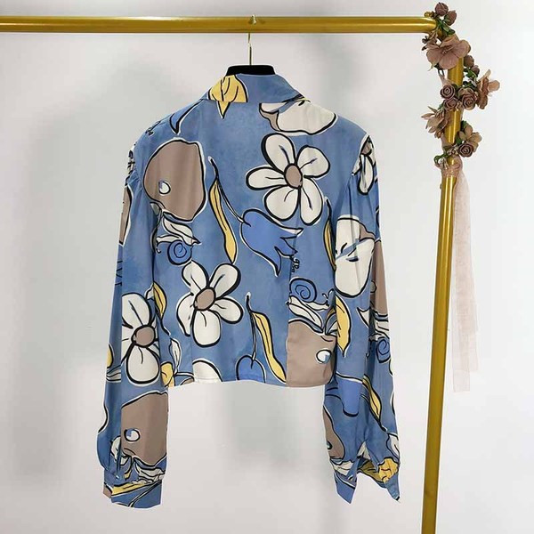 Rövid, kék színű, mintás mintás női ing, hosszú ujjal