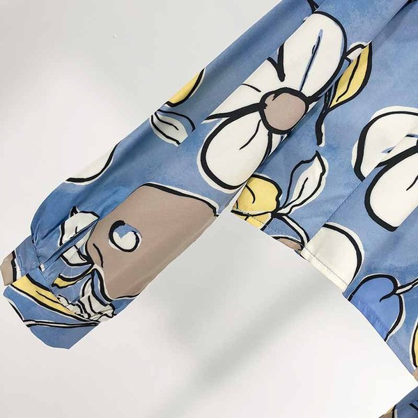 Rövid, kék színű, mintás mintás női ing, hosszú ujjal