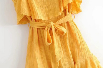 Modern női ruha vékony pántokkal, sárga színben