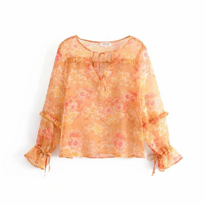 Női blúz narancssárga mintával