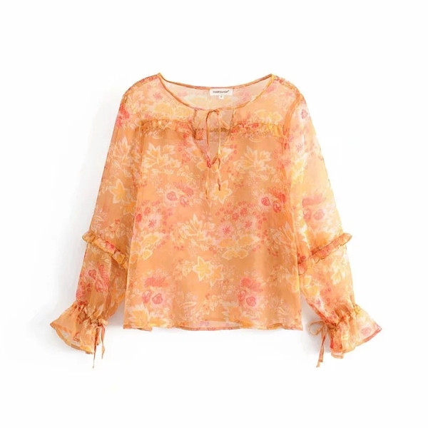 Női blúz narancssárga mintával
