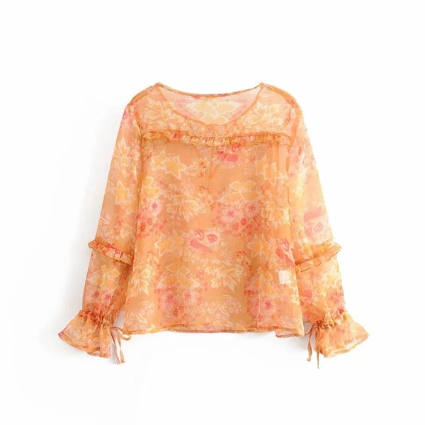 Női blúz narancssárga mintával