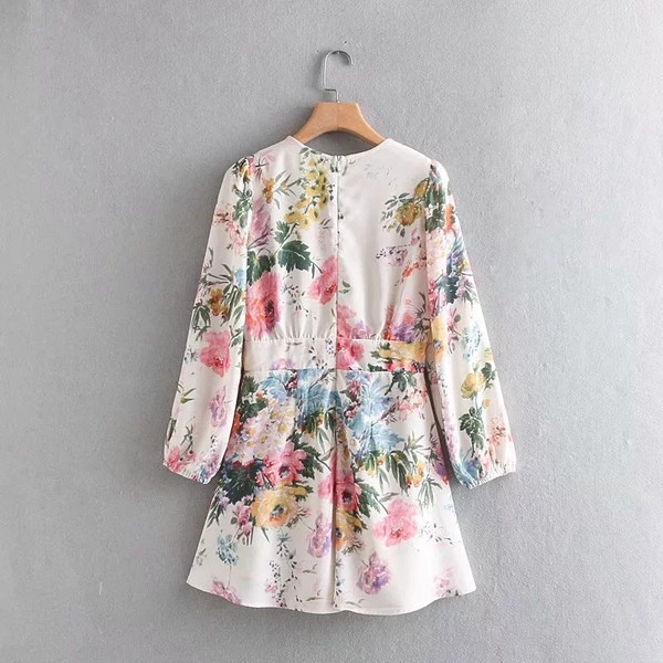 Salopeta de dama cu maneci lungi si model floral