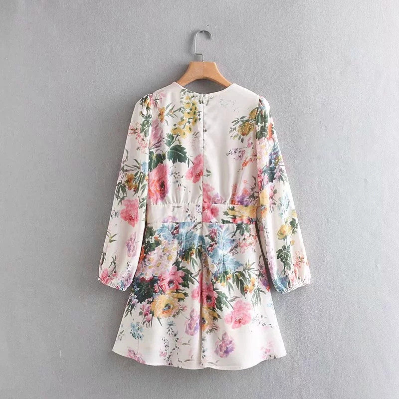 Salopeta de dama cu maneci lungi si model floral