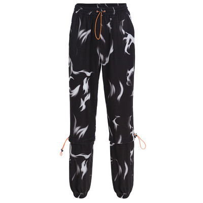 Modern női nadrág elasztikus derékkal és megkötővel