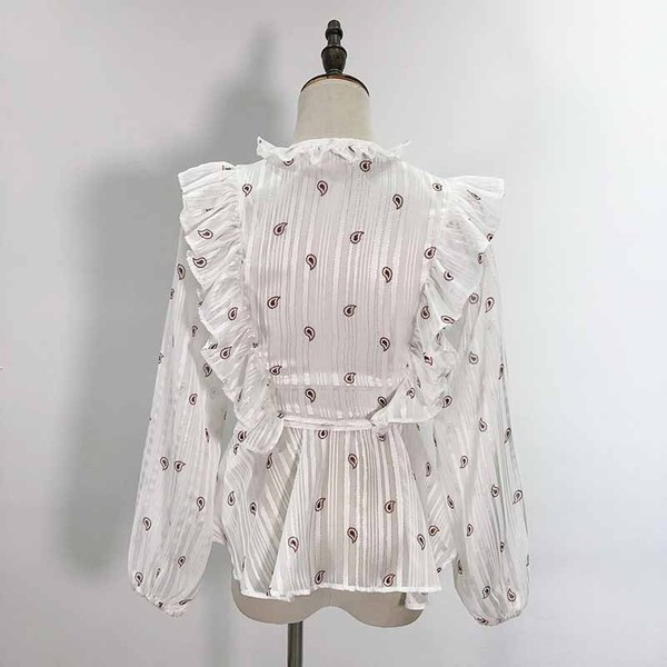 Bluză de damă cu decolteu în V adânc și legături în talie