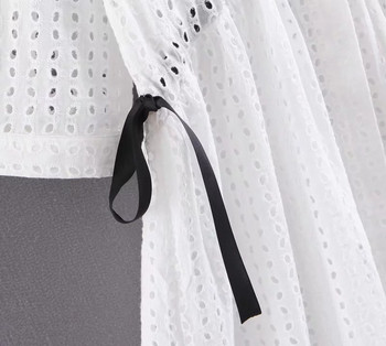 Modern női ruha, fehér derékkötővel