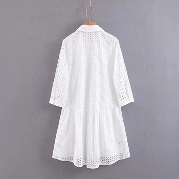 Modern női ruha, fehér derékkötővel