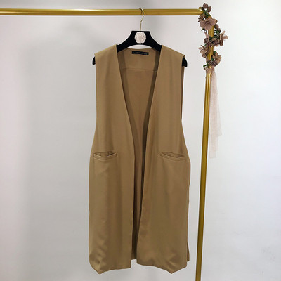 Két színben zsebes női mellény