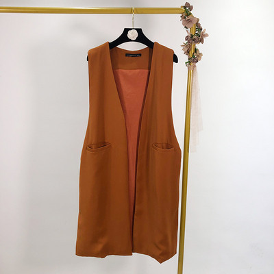 Két színben zsebes női mellény