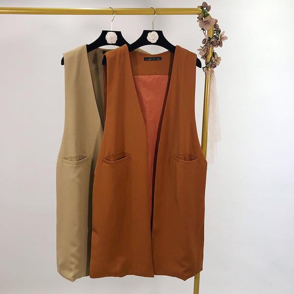 Két színben zsebes női mellény