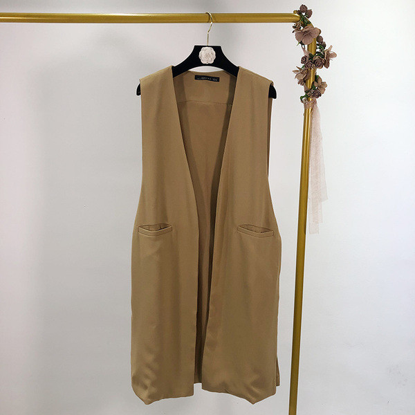 Két színben zsebes női mellény