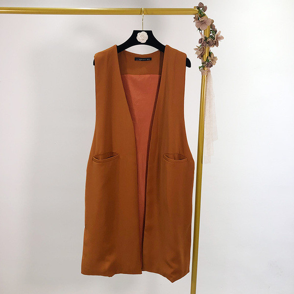 Két színben zsebes női mellény