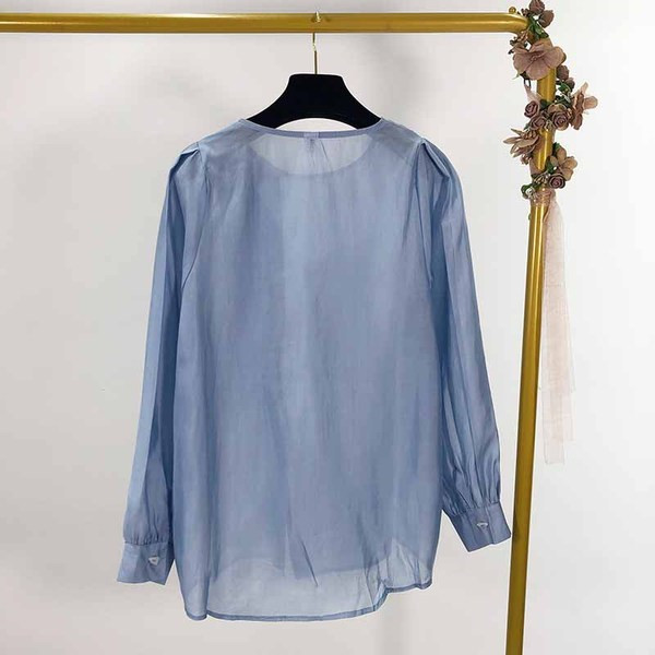 Női ing hosszú ujjal és gombokkal kék színben