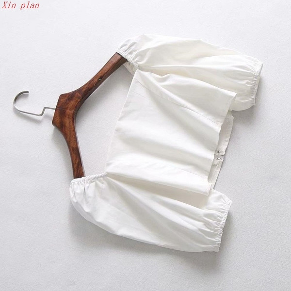 Női modern rövid fehér blúz