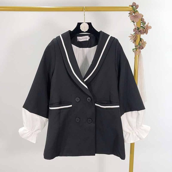 Fekete színű női kabát, ujjain gumival