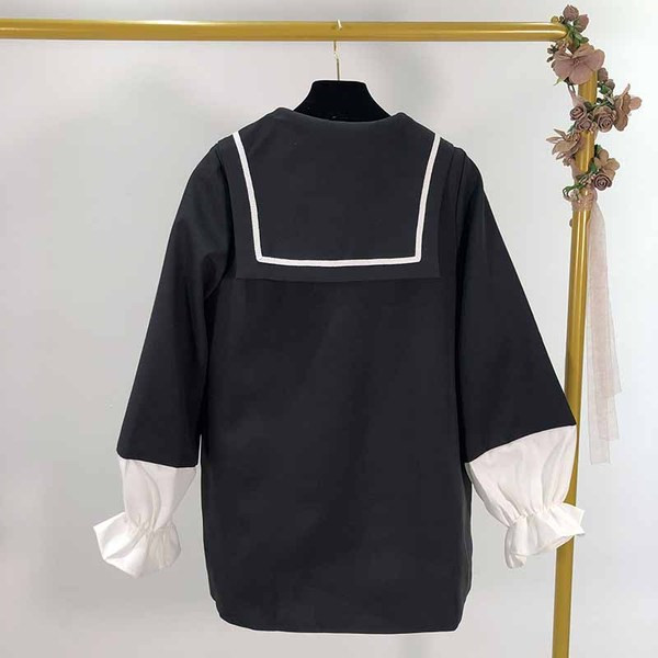 Fekete színű női kabát, ujjain gumival