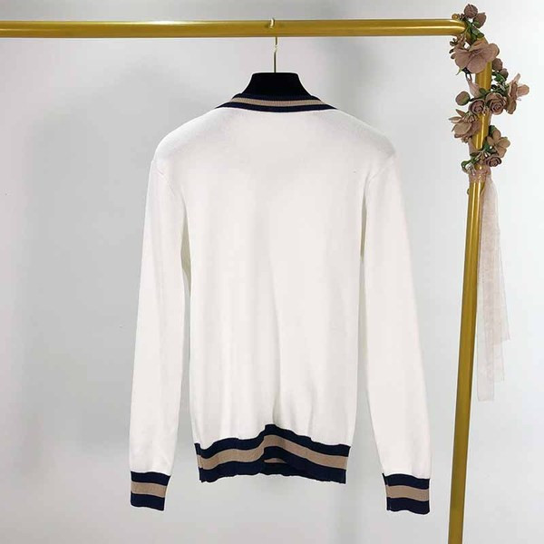 Női pulóver három színben, színes gumiszalaggal