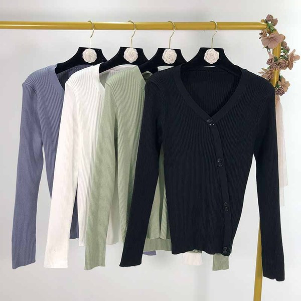 Női hosszú ujjú pulóver és gombok három színben